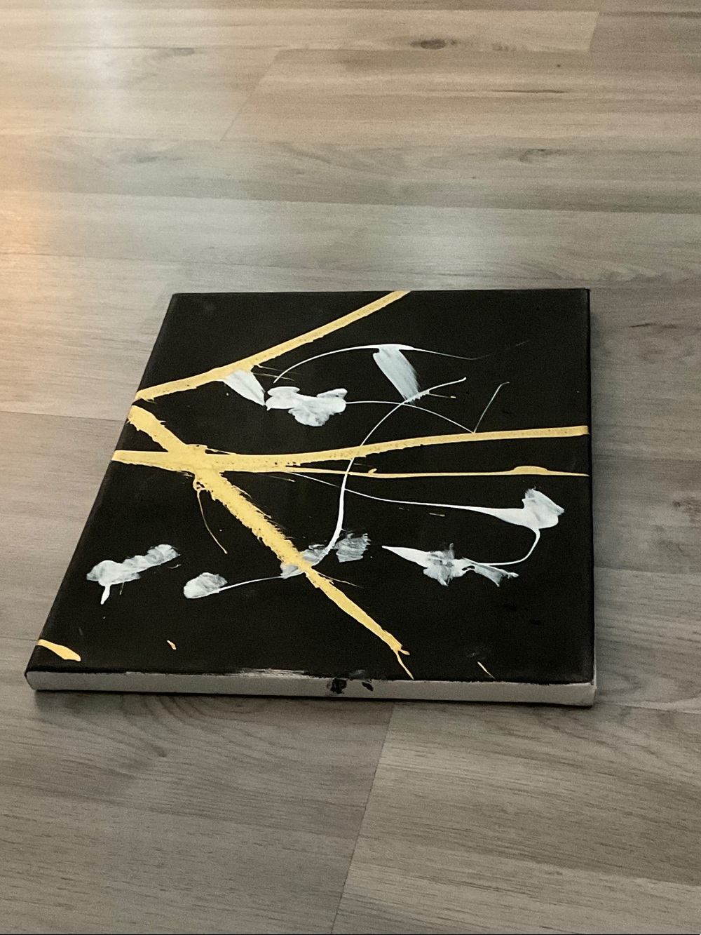 Abstract Black Canvas Wall Art with Gold and White Accents
